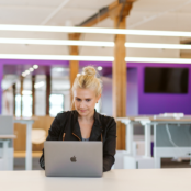 woman works at a laptop